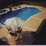 New pool with raised spa finished in Florida Stucco's Hawaiian Blue Gem