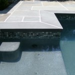 Newly constructed pool in sleek customized lines.  Finished in Hydrazzo French Gray