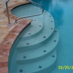 Detail of steps with newly added sunledge. Finished in Florida Stucco's White Gem